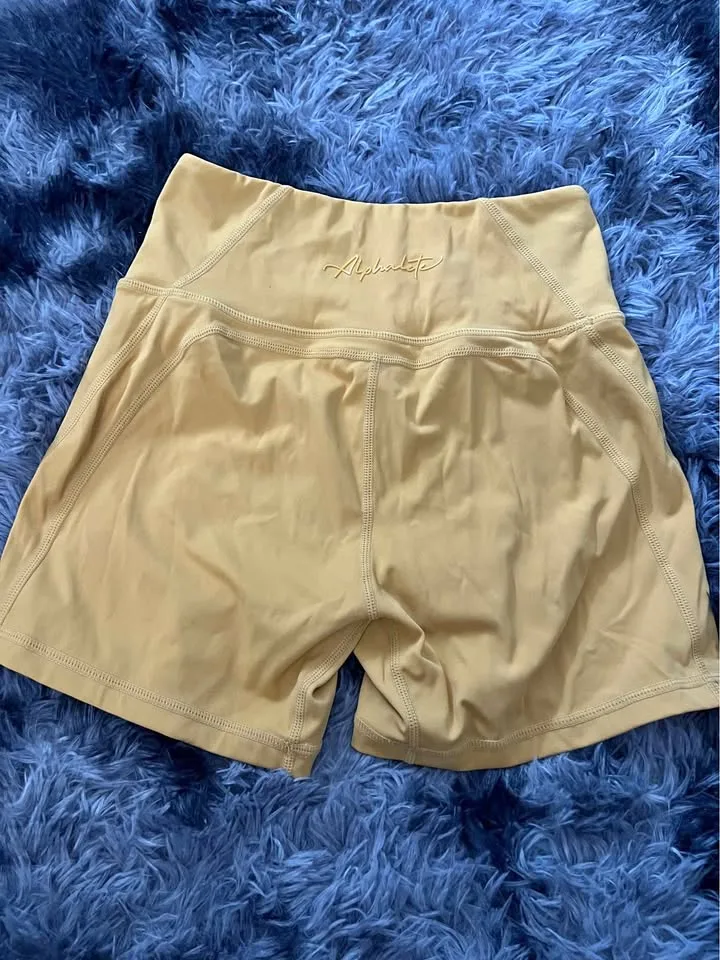 Alphalete yellow gym bikers thumbnail