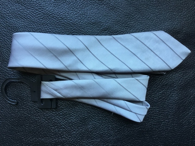 slim grey striped necktie