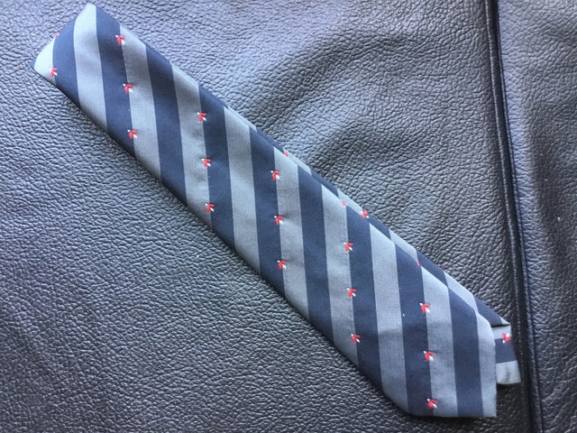 grey necktie with black stripes