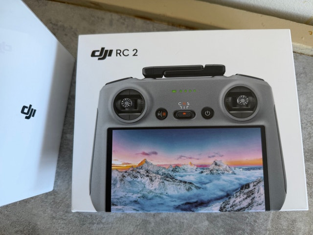 Brand new unopened DJI mini 4 pro w/ RC-2, 2 batteries, charger - photo 2