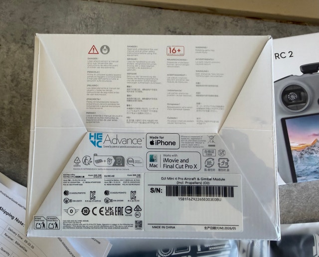 Brand new unopened DJI mini 4 pro w/ RC-2, 2 batteries, charger - photo 3