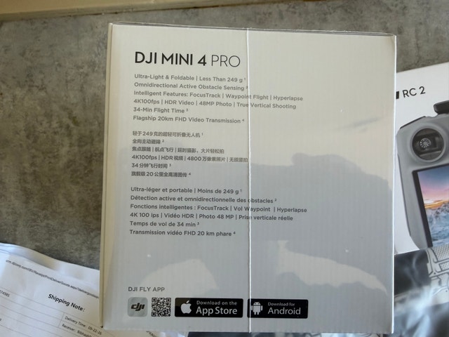 Brand new unopened DJI mini 4 pro w/ RC-2, 2 batteries, charger - photo 5