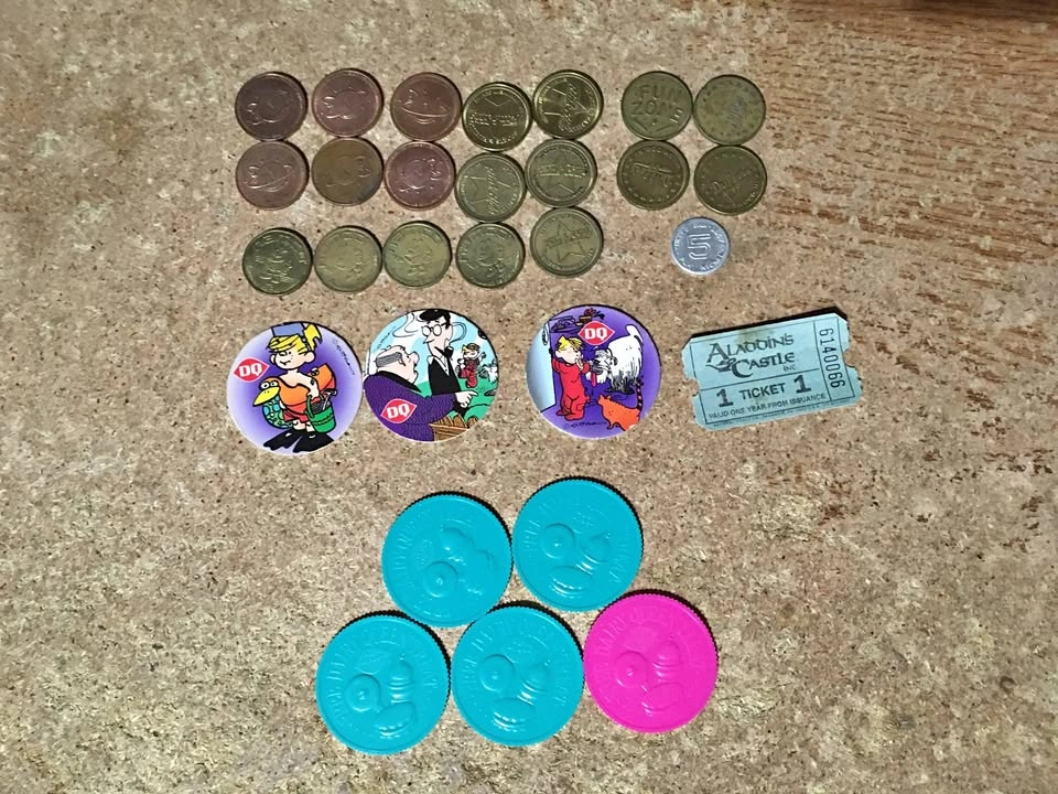 LOT OF 28 DAIRY QUEEN PLASTIC TOKENS DENNIS THE MENACE POG