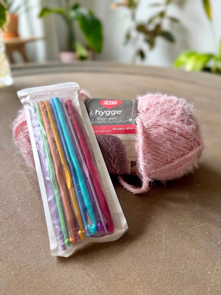 Crochet Hook Set and pink yarn