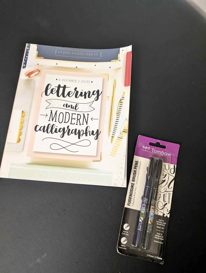 Lettering workbook & pens