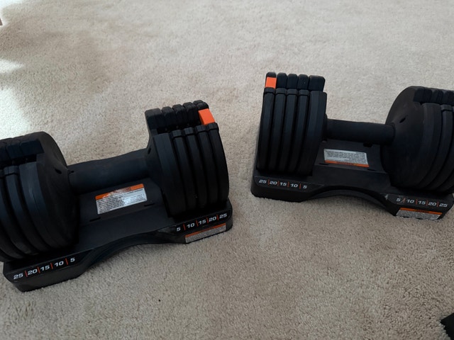 2 NordicTrack Adjustable Dumbbells 5–25 lb each