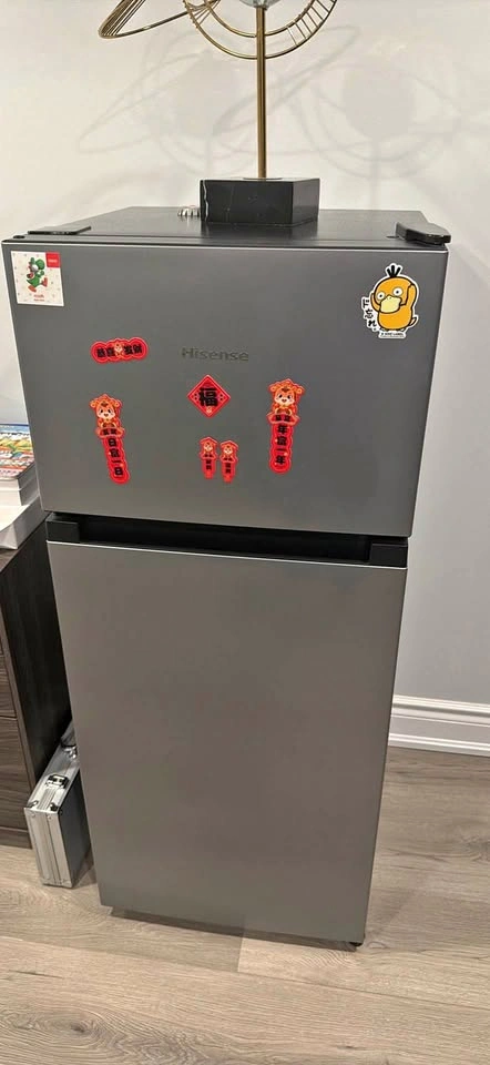 Hisense mini/compact refrigerator with separate top freezer