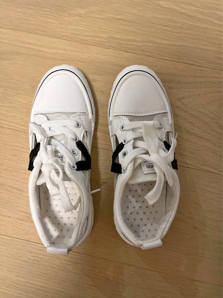 White Sneakers with Black Accents