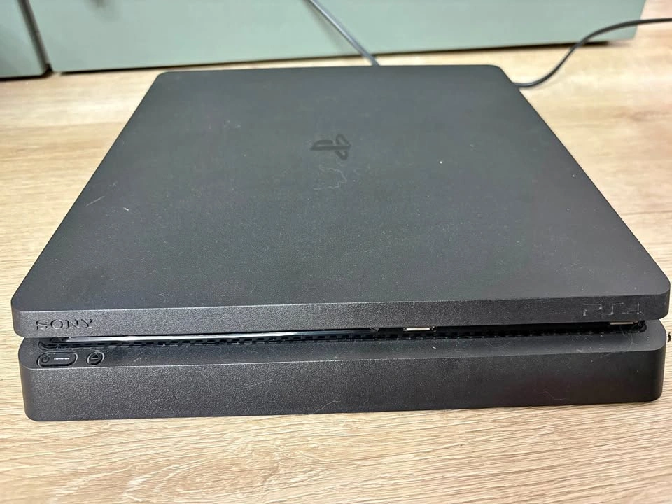 Sony PlayStation 4 Slim with Controller and 4 Games