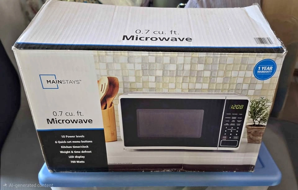 Mainstays Microwave .07 cu ft like new with box