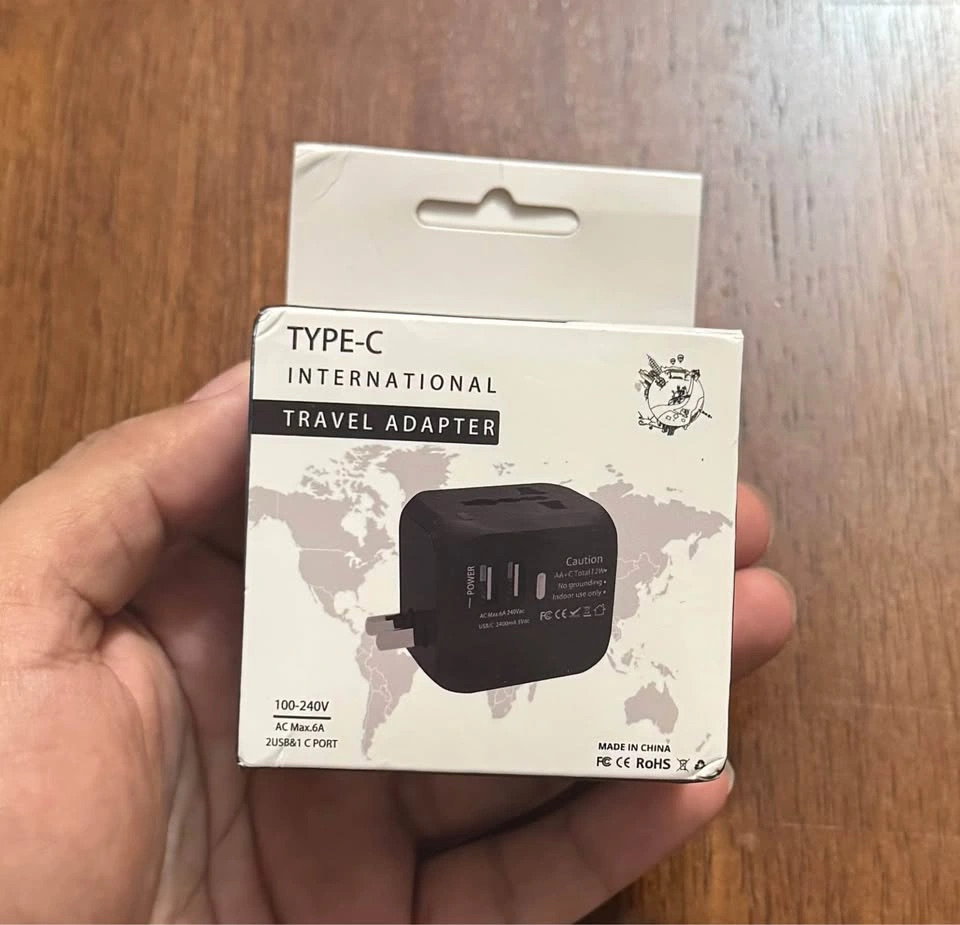 International Travel Adapter *NEW* - photo 2