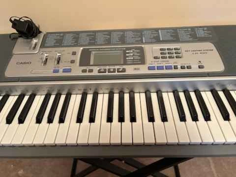 Casio LK-100 Key Lighting Keyboard with Stand and Bench - photo 3