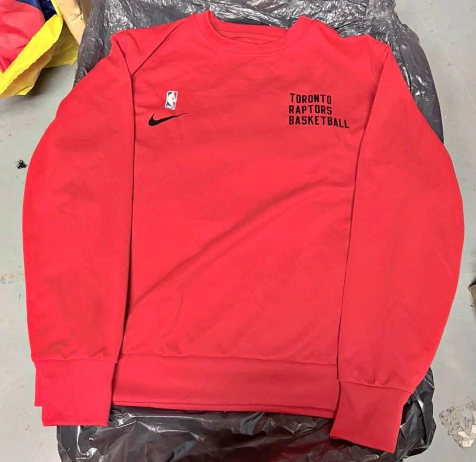 Size Medium: Nike Raptors Sweater