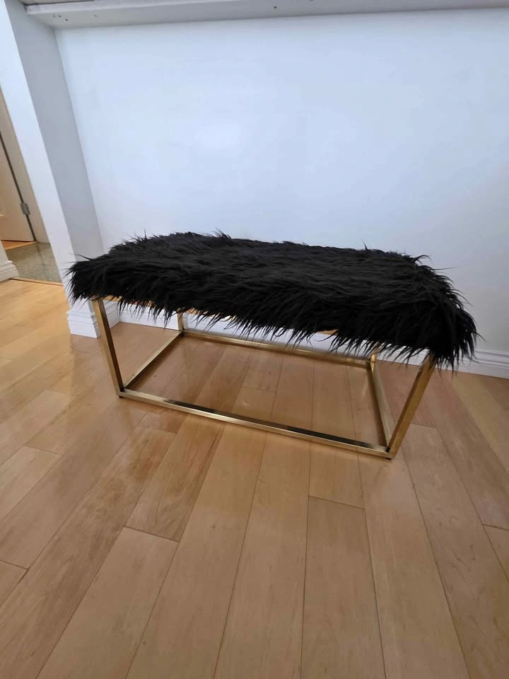 Faux fur bench in black and gold
