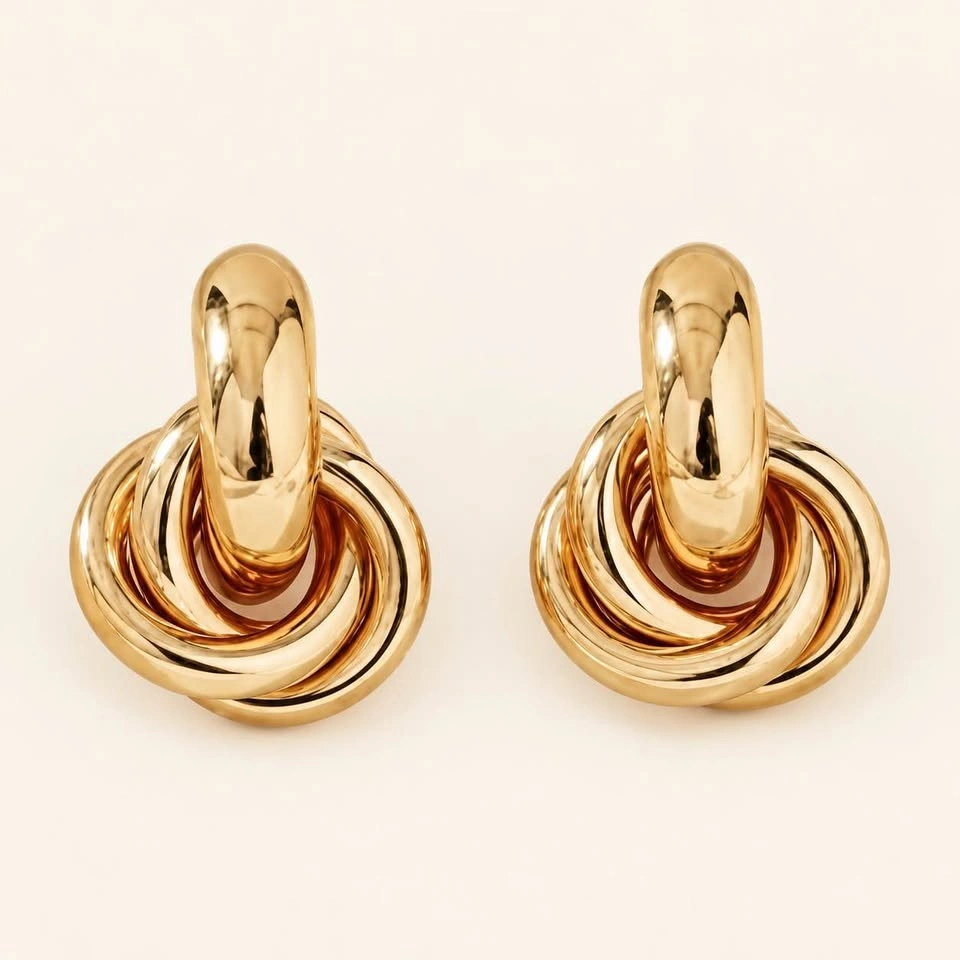 Gold tone earrings - photo 2