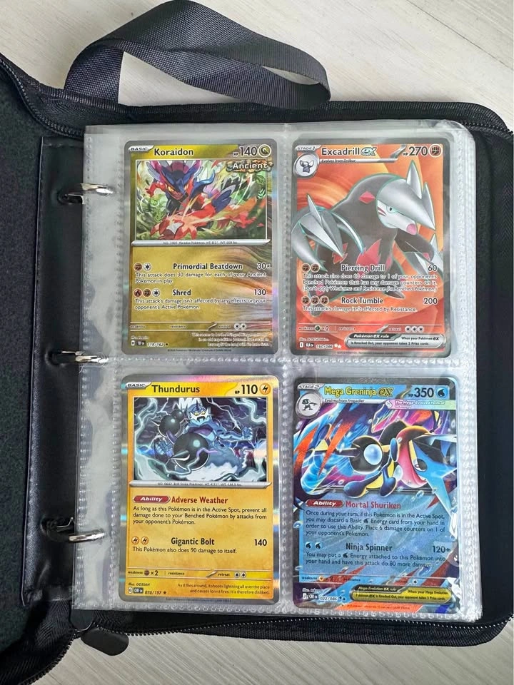 Filled Pokémon card binder