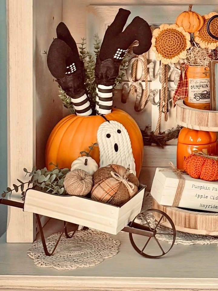 Wheelbarrow w/ pumpkins & greenery