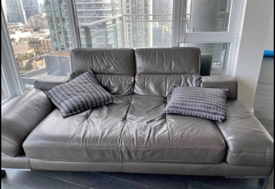Free! XL leather couch with adjustable back and side arms