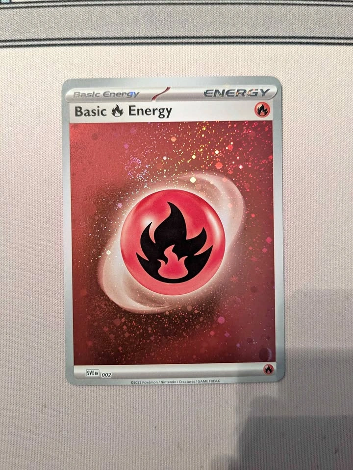 Pokemon Fire Holo energy with 4 swirls
