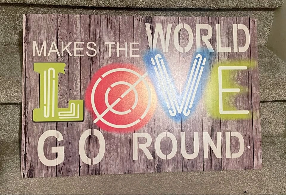 16x24” wall decor Love makes the world go round