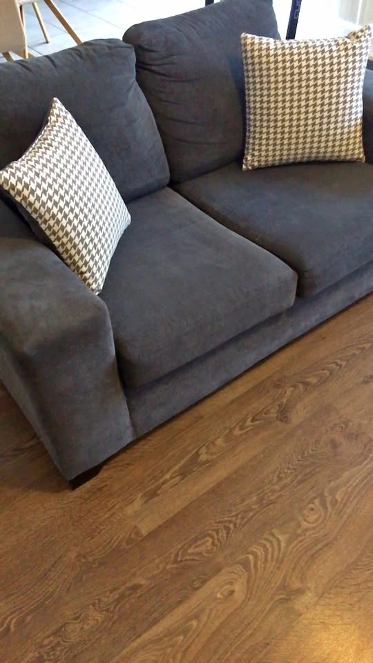 Dark Gray Sofa with Houndstooth Pillows