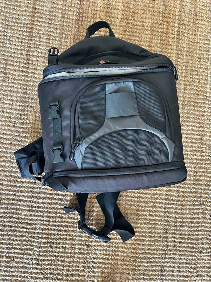 Like new Lowepro Slingshot 100 AW Camera Bag with rain cover