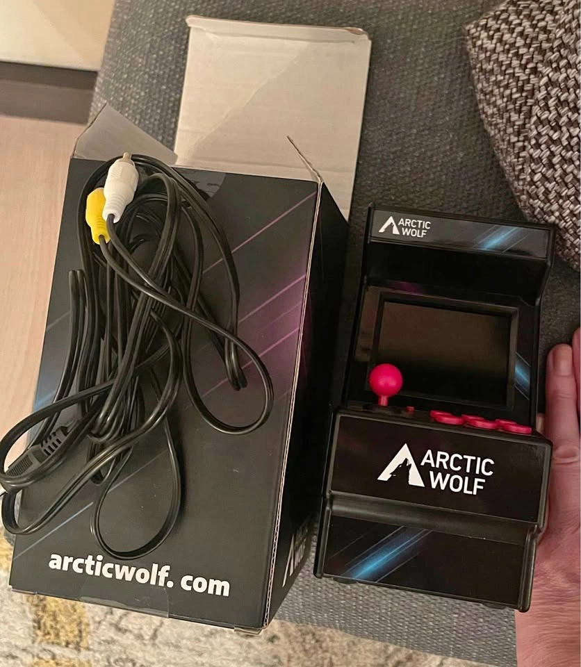 Like new Artic Wolf mini arcade console with 156 16 bit games