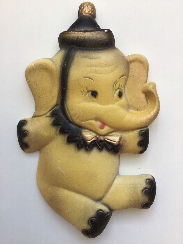 Vintage chalkware elephant wall hanging