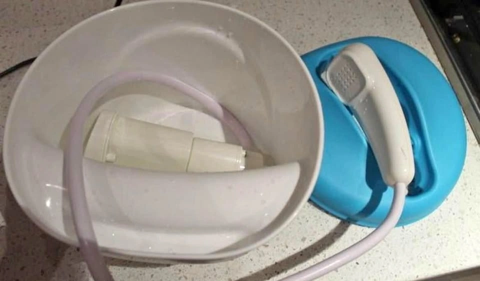 Portable motorized baby shower head, like new
