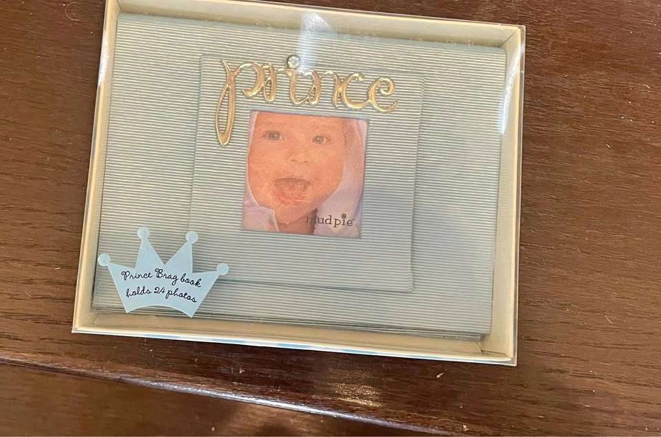Never used prince baby photo album for 24 5x7” pictures