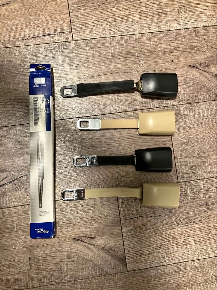 Seat belt extenders