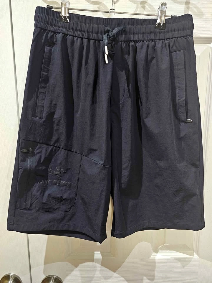 Arc'teryx Navy Blue Athletic Shorts with Zipper Pockets