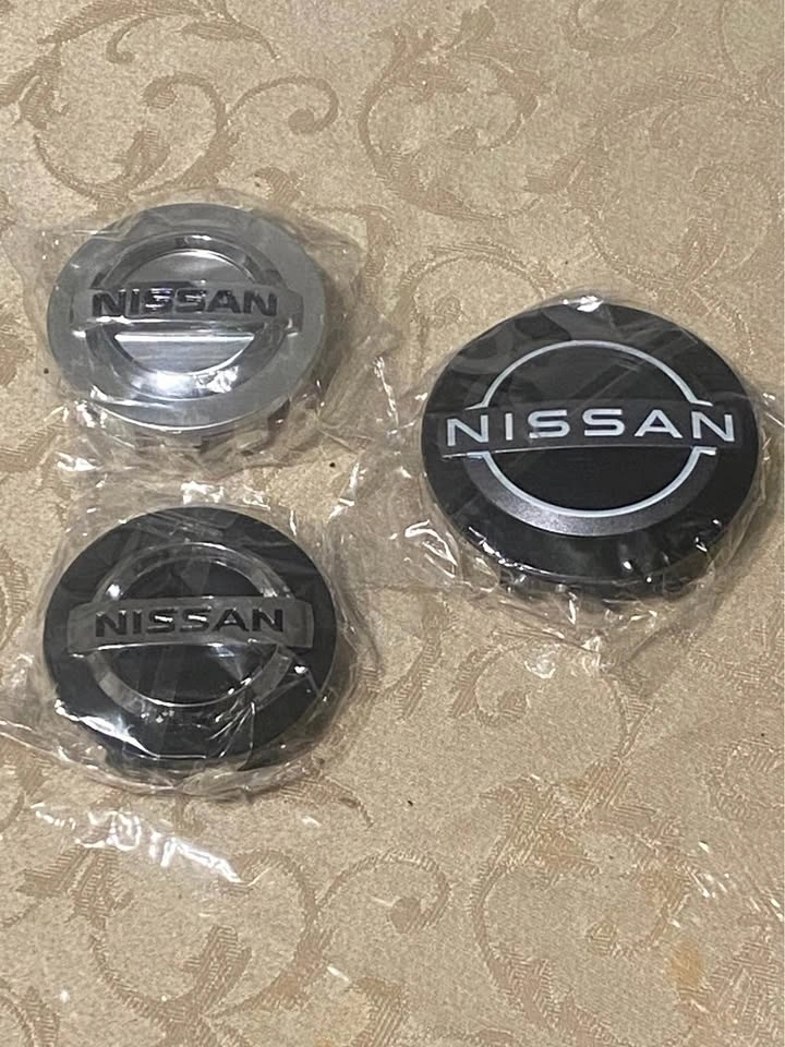 Nissan logo center caps - photo 5