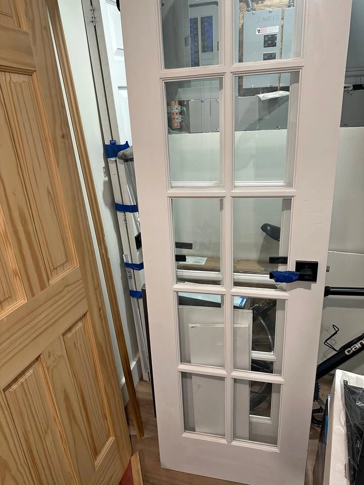 2 White 10-Lite Interior French Doors with Black Hardware