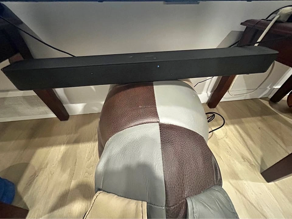 Black Soundbar Speaker with box, and remote.