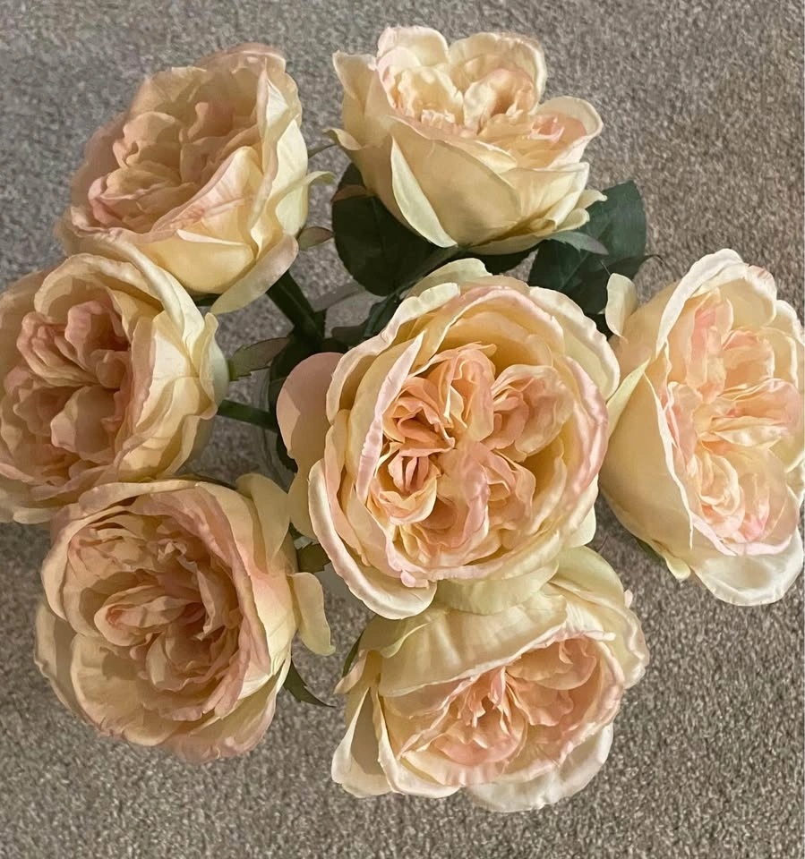 Beautiful fake roses in glass vase (water bottle for scale) - photo 2
