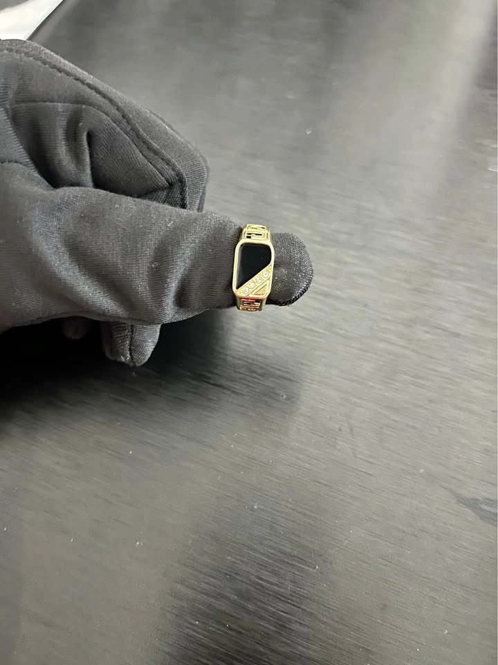 Men's Gold-Toned Signet Ring with Black Inlay and Greek Key Patt