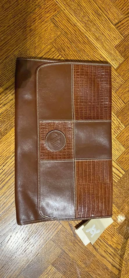 Plinio Visonà clutch with tags on