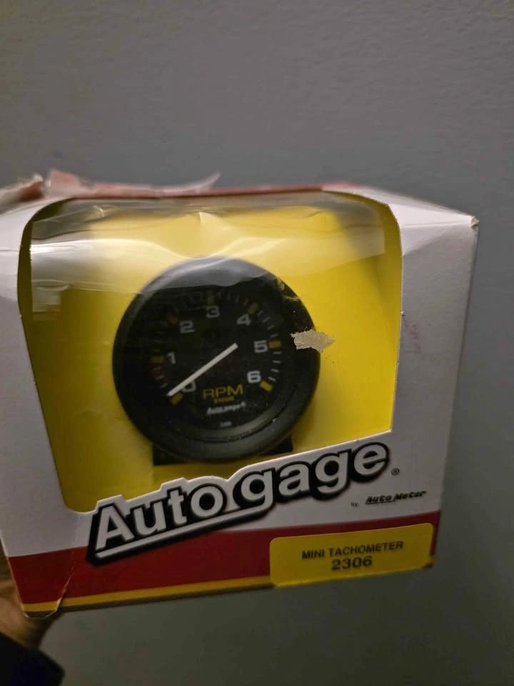 Auto gage by Auto Meter Gauge RPM Tachometer 2306