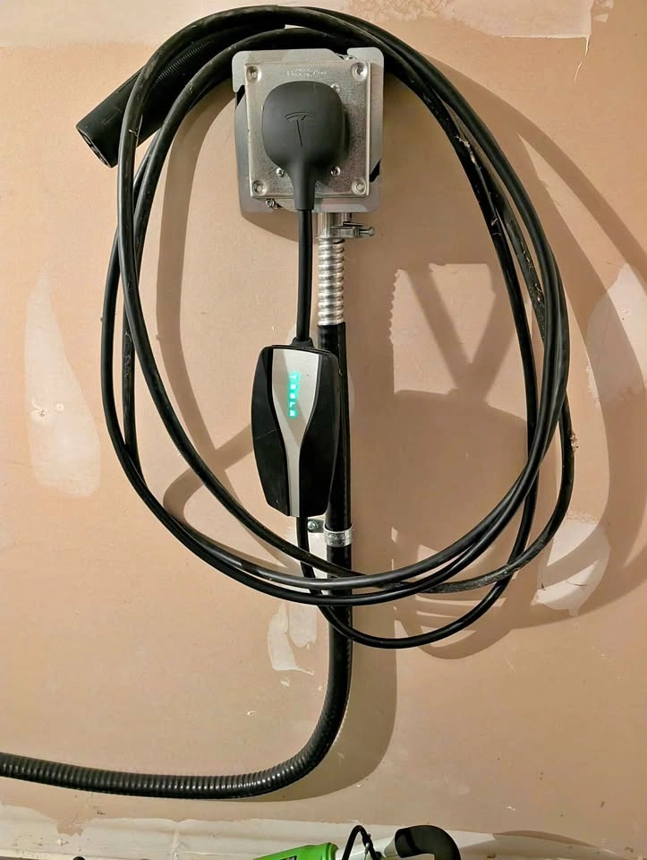 Tesla mobile wall connector charger with NEMA 14-50 adapter