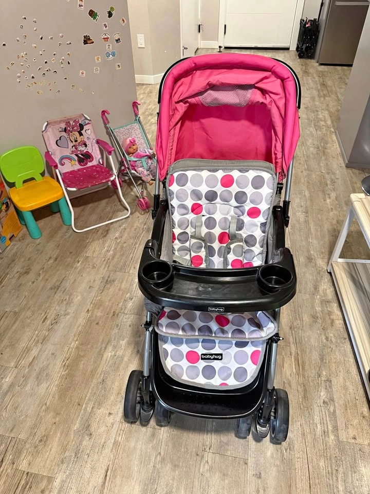 Babyhug Pink and Polka Dot Stroller