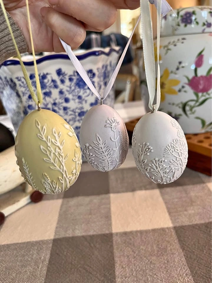 Ceramic Nutcrackers and Embossed Egg Ornaments