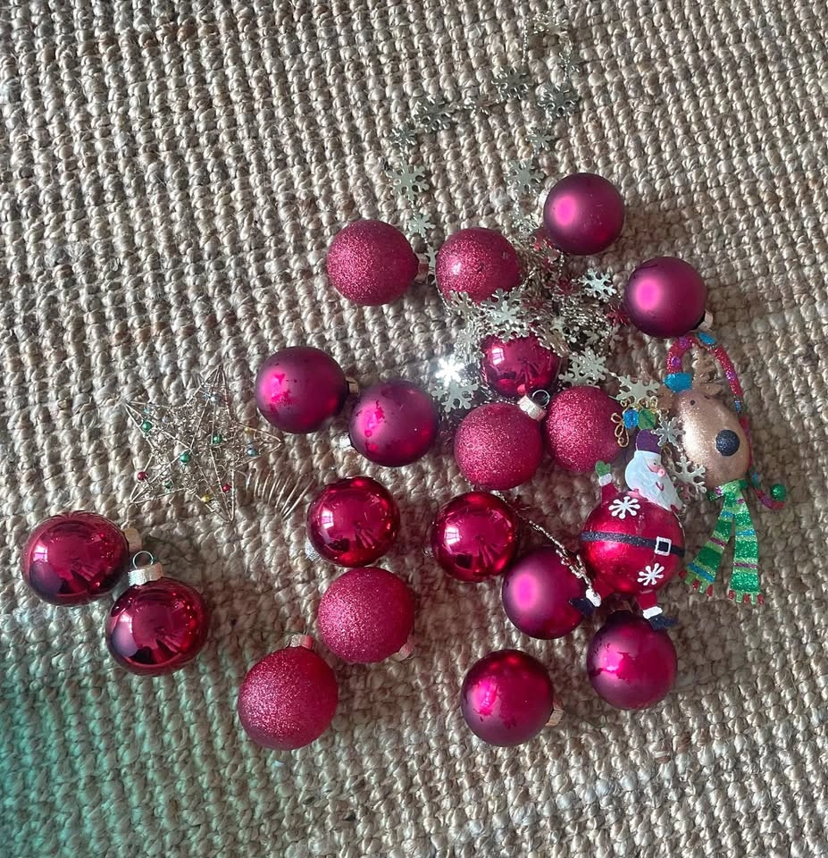 Lot of red Christmas ornaments, star tree topper
