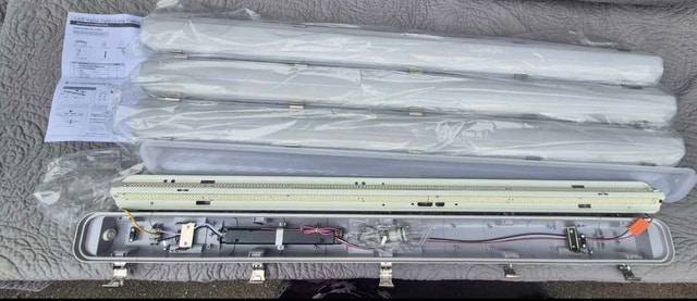New 4 pk LED Light Fixtures