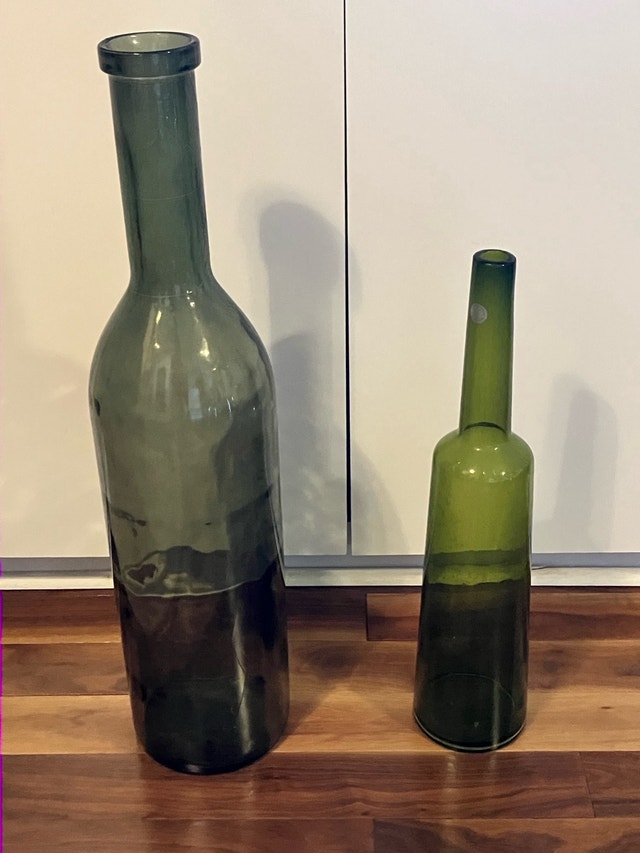 Two extra large green glass wine bottles