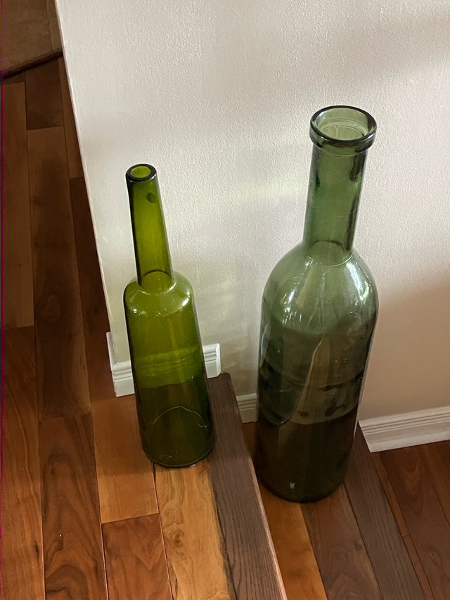 Two Large Glass Bottles