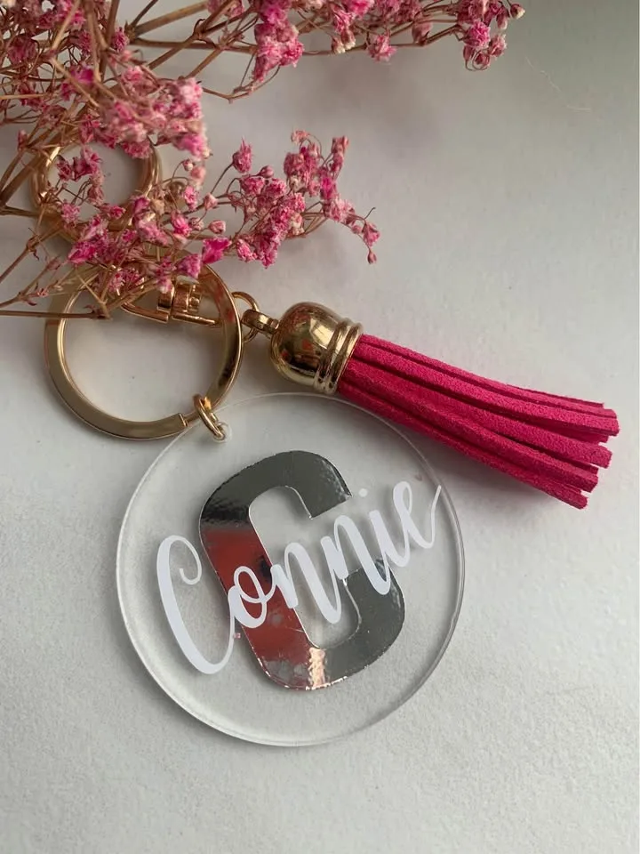 colorful keychains with tassels in different colors image indicator(4)