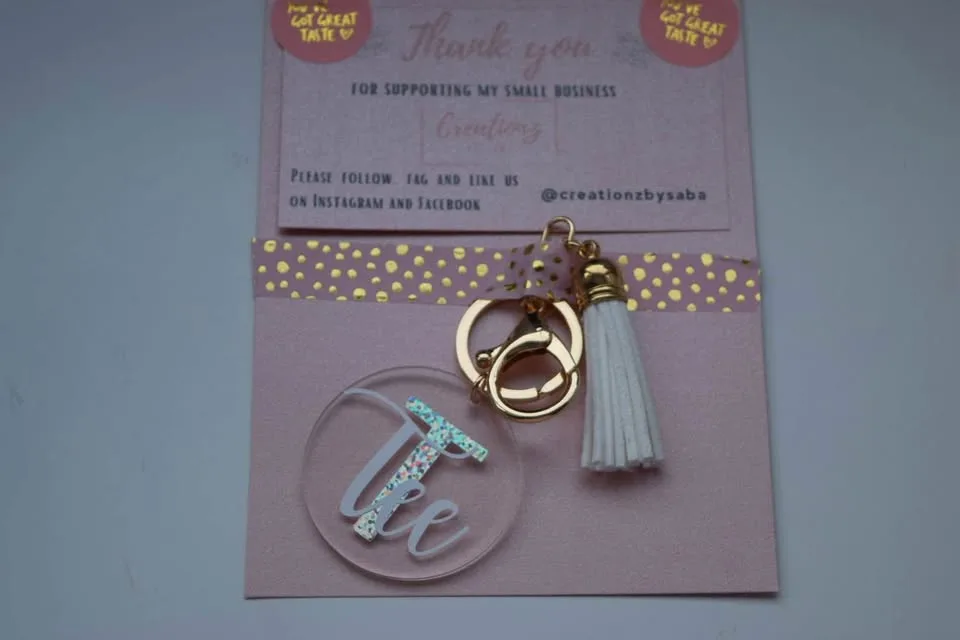 colorful keychains with tassels in different colors image indicator(8)