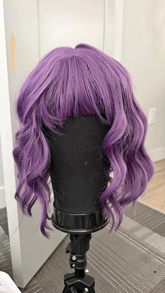 Purple wavy bob wig with bangs