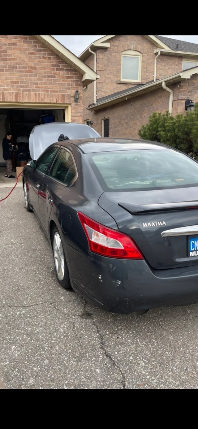 Nissan maxima SL certified and new transmission.